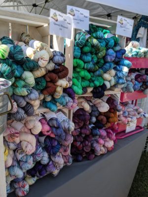 Indie dyed yarn on table at fiber festival
